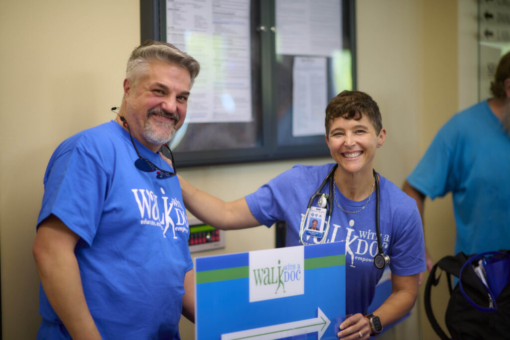 Two CHP Doctors Smiling at Event